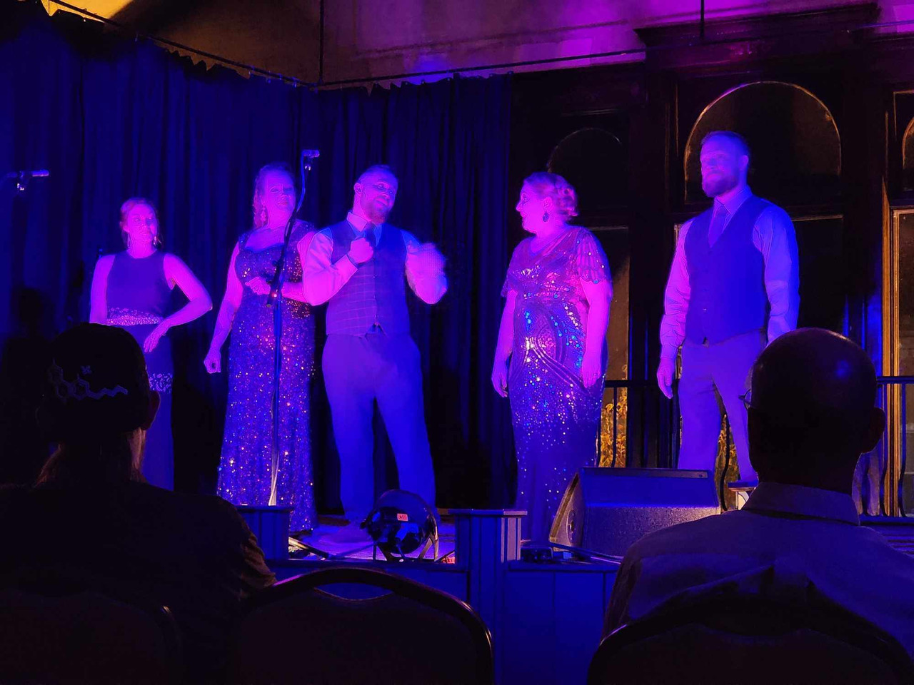 Performers in a dramatic moment on the Rooted Gypsy Repertoire stage